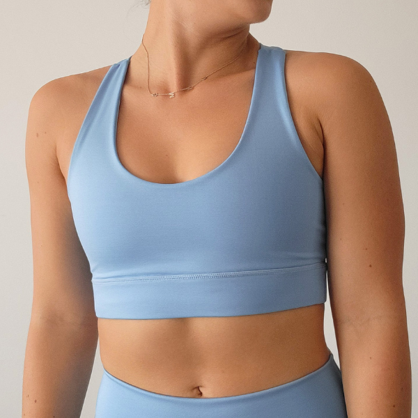 Top deportivo de alta compresión celeste