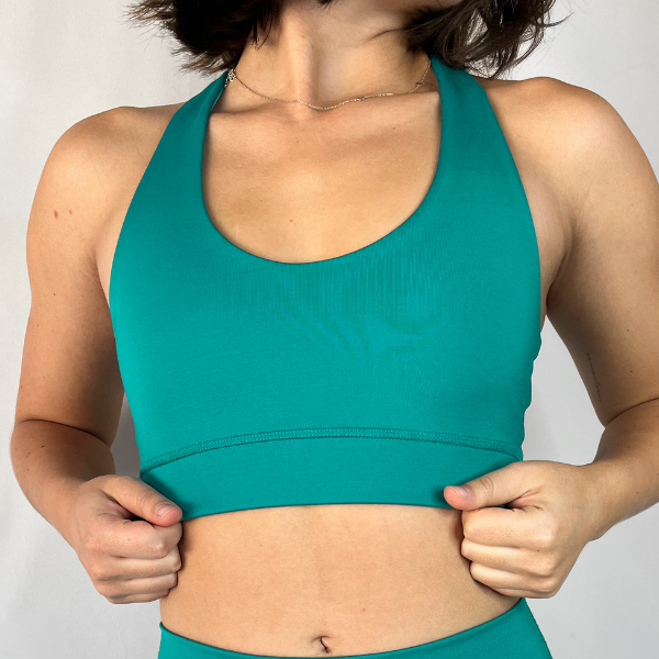 Top deportivo de alta compresión turquesa